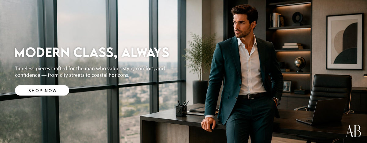 Man in a tailored teal blazer and white shirt in a modern officeh2