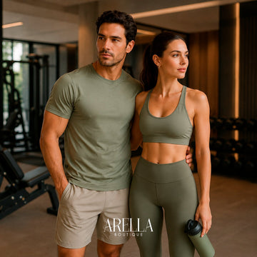 Couple in matching sage activewear in a gym
