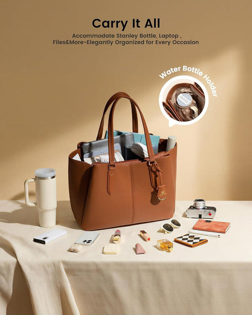 Work tote filled with a laptop, a tumbler and daily essentials